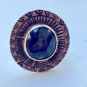 Large vintage faceted sapphire gem in wide engraved silver bezel setting
